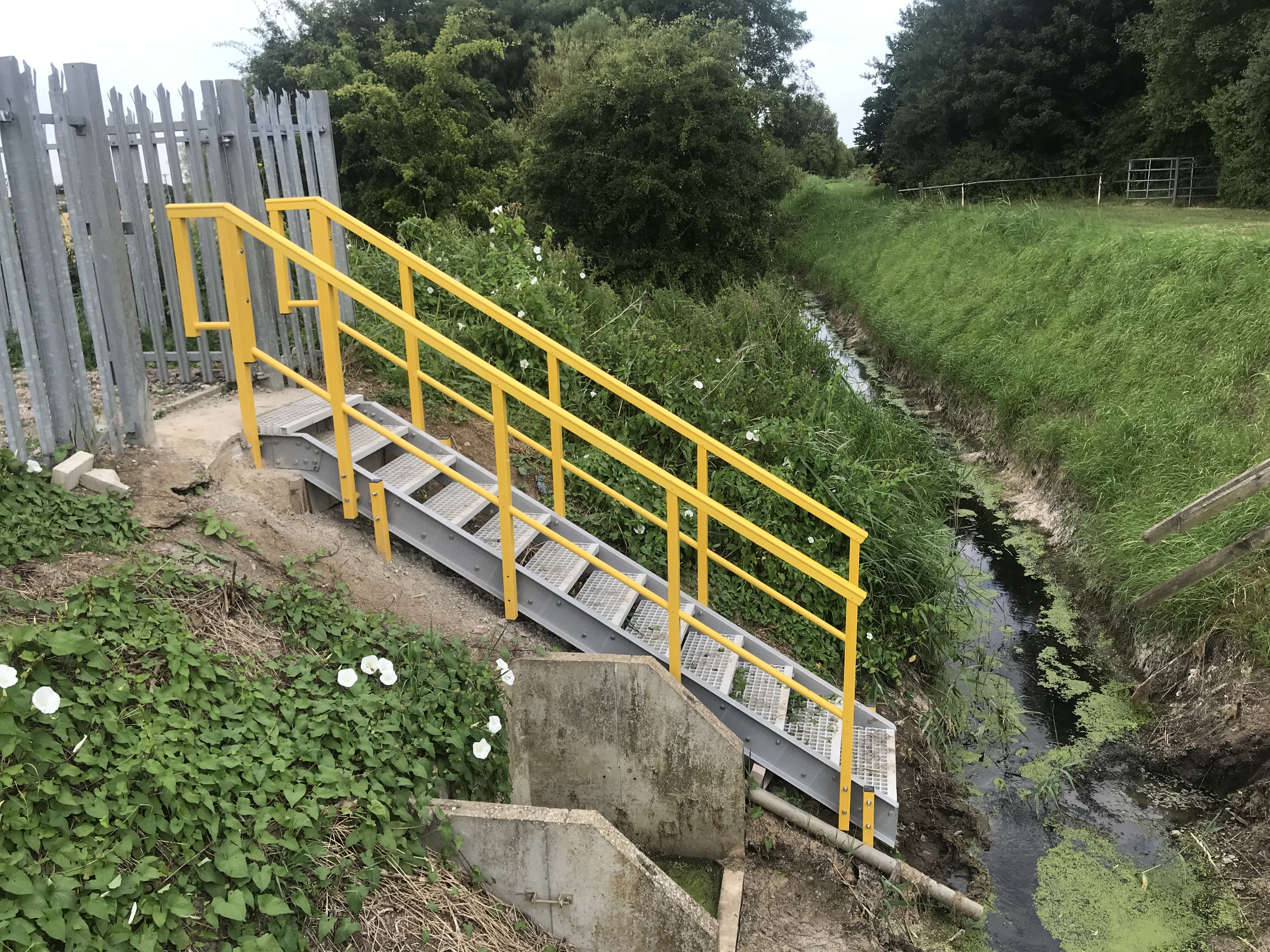 GRP embankment stairs beside a watercourse