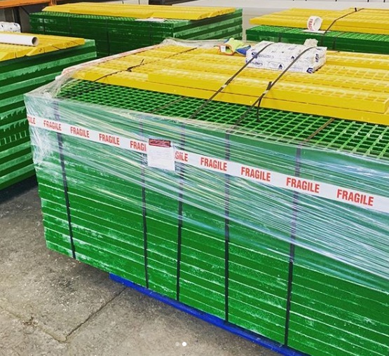 Green and yellow GRP grating panels and ramps