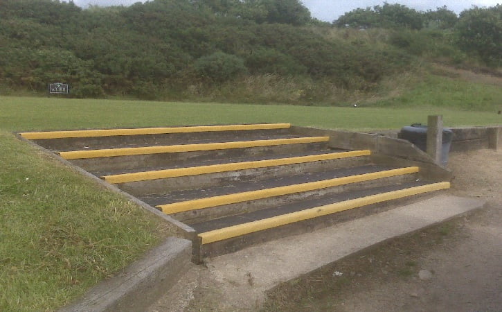 Yellow GRP stair tread nosings on external concrete steps