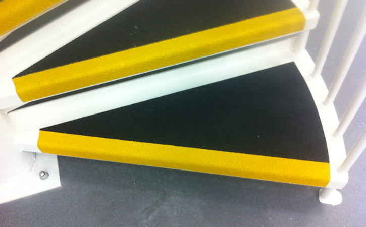 Black GRP stair treads with yellow nosings